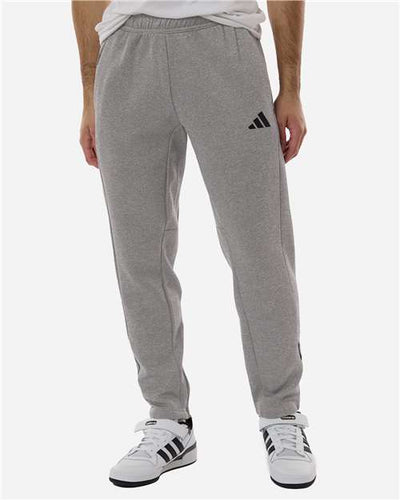 Adidas AT218 Men's Game & Go Fleece 3-Bar Sweatpants - Medium Grey Heather - model front