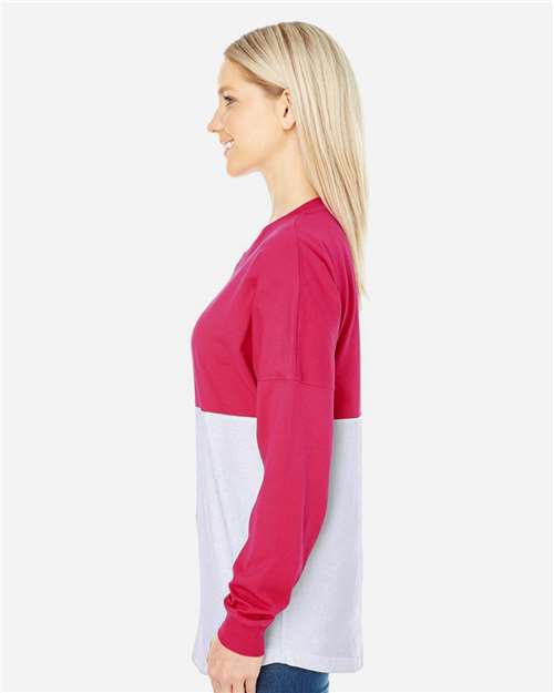 J. America 8229 Unisex Game Day Jersey Long Sleeve T-Shirt - Wildberry/ White - model side