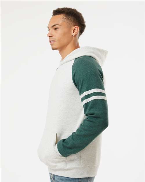 Jerzees 97CR Unisex Nublend Varsity Colorblocked Raglan Hooded Sweatshirt - Oatmeal Heather/ Forest Green Heather - model side