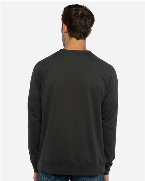 Next Level 9000 Unisex Laguna Raglan Crewneck Sweatshirt - Graphite Black - model back