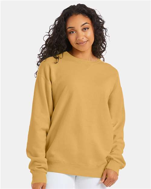 Hanes GDH400 Unisex Garment-Dyed Crewneck Sweatshirt - Artisan Gold - model front