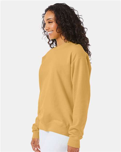 Hanes GDH400 Unisex Garment-Dyed Crewneck Sweatshirt - Artisan Gold - model side