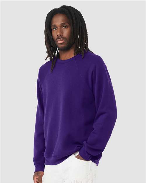 BELLA + CANVAS 3901 Unisex Sponge Fleece Raglan Crewneck Sweatshirt - Team Purple - model side