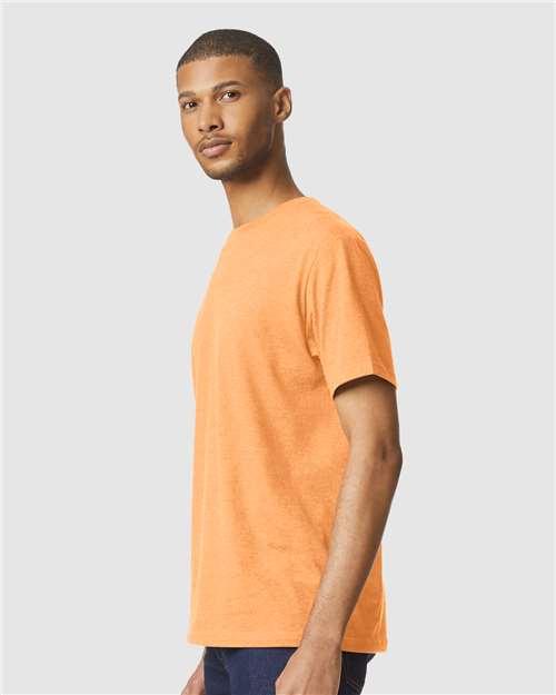 Gildan 64000CVC Unisex Softstyle CVC T-Shirt - Tangerine Mist - model side