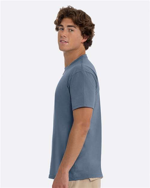 Next Level 3600 Unisex Cotton T-Shirt - Blue Jean - model side