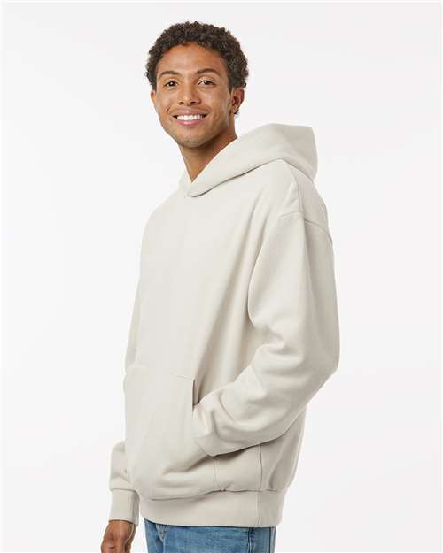 Independent Trading Co. IND420XD Unisex Mainstreet Heavyweight Hooded Sweatshirt - Ivory - model side