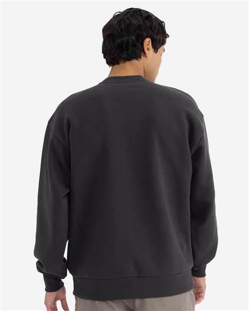 Next Level 9007 Unisex Heavyweight Crewneck Sweatshirt - Graphite Black - model back