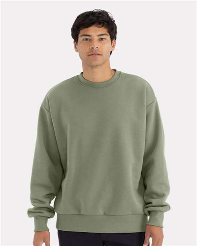 Next Level 9007 Unisex Heavyweight Crewneck Sweatshirt - Light Olive - model front