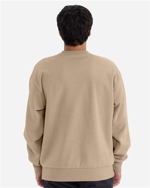 Next Level 9007 Unisex Heavyweight Crewneck Sweatshirt - Tan - model back