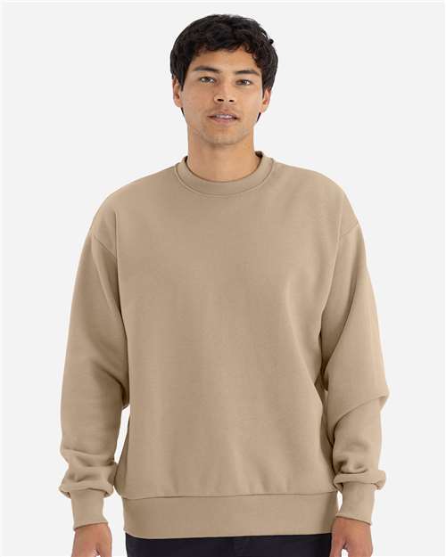 Next Level 9007 Unisex Heavyweight Crewneck Sweatshirt - Tan - model front