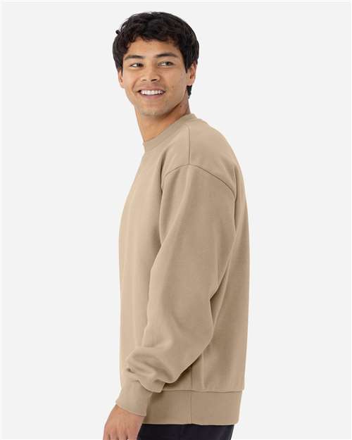 Next Level 9007 Unisex Heavyweight Crewneck Sweatshirt - Tan - model side