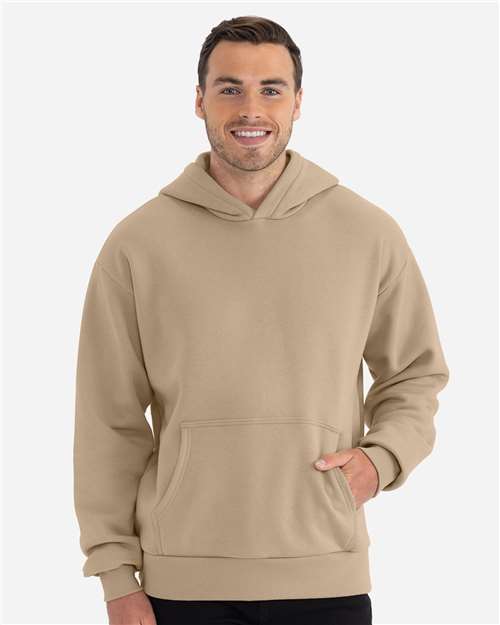 Next Level 9307 Unisex Heavyweight Fleece Hoodie Sweatshirt - Tan - model front