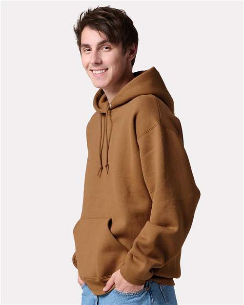 Jerzees H12MR Unisex Rugged Hooded Sweatshirt - Golden Pecan - model side