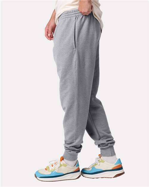 Jerzees IC50MPR Unisex Ultimate CVC Joggers - Athletic Heather - model side