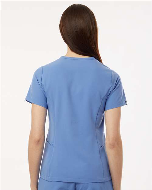Jaanuu W10003 Women's Calix Fit & Flare Scrub V-Neck Top - Ceil Blue - model back