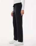 Jaanuu W20001 Women's Xenos Essential Knit-Waist Scrub Pants - Black - model side
