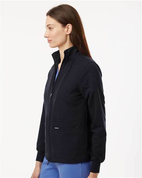 Jaanuu W60001 Women's Ceri Essential Full-Zip 6-Pocket Scrub Jacket - Black - model side