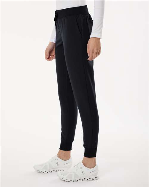 Jaanuu W20003P Women's Petite Sizes Silex Knit-Waist Scrub Joggers - Black - model side