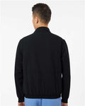 Jaanuu M60001 Men's Wolfe Everyday Full-Zip 6-Pocket Scrub Jacket - Black - model back