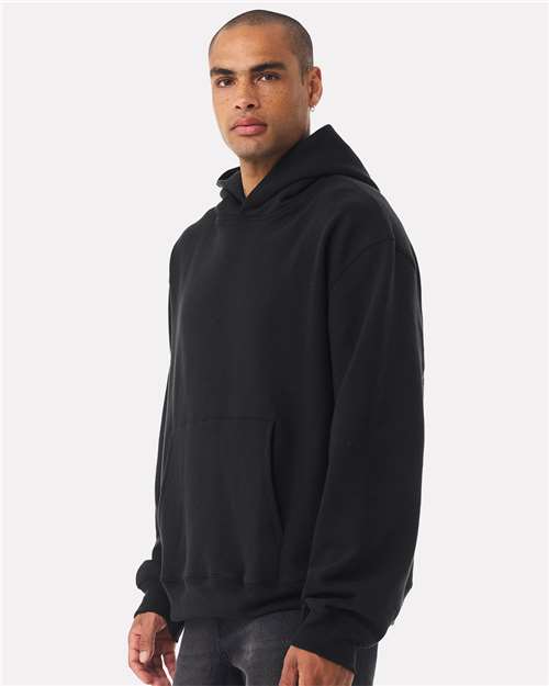 BELLA + CANVAS 4719 Unisex 10 oz. Heavyweight Hoodie Sweatshirt - Vintage Black - model side