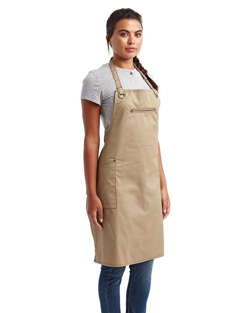 Artisan Collection by Reprime RP121 Barley Contrast Stitch Recycled Bib Apron - Khaki/ Brown - model side