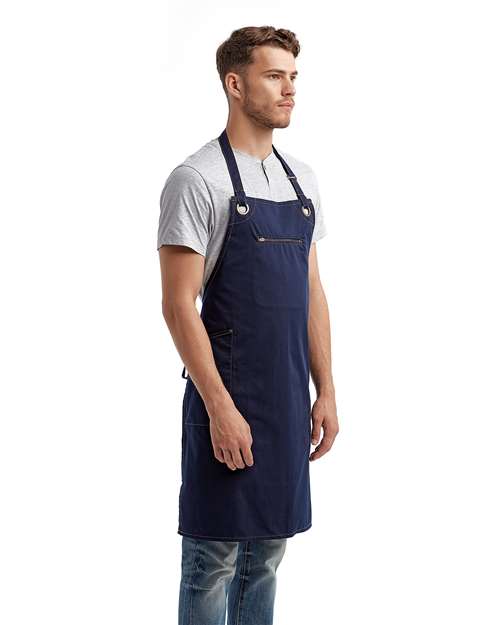 Artisan Collection by Reprime RP121 Barley Contrast Stitch Recycled Bib Apron - Navy/ Camel - model side
