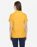Core 365 CE112W Women's Fusion ChromaSoft Pique Polo - Campus Gold - model back