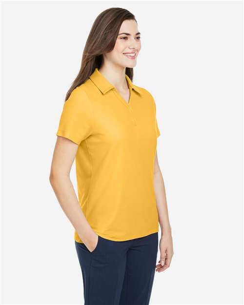 Core 365 CE112W Women's Fusion ChromaSoft Pique Polo - Campus Gold - model side