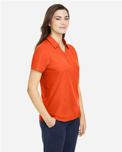 Core 365 CE112W Women's Fusion ChromaSoft Pique Polo - Campus Orange - model side