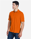 Core 365 88181 Origin Performance Piqué Polo - Campus Orange - model side