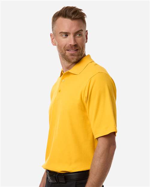 Core 365 CE106 Men's Resolve CVC Performance Pique Polo - Campus Gold - model side