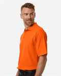 Core 365 CE106 Men's Resolve CVC Performance Pique Polo - Campus Orange - model side