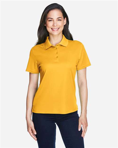 Core 365 78181 Women's Origin Performance Piqué Polo - Campus Gold - model front