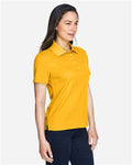 Core 365 78181 Women's Origin Performance Piqué Polo - Campus Gold - model side