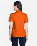 Core 365 78181 Women's Origin Performance Piqué Polo - Campus Orange - model back