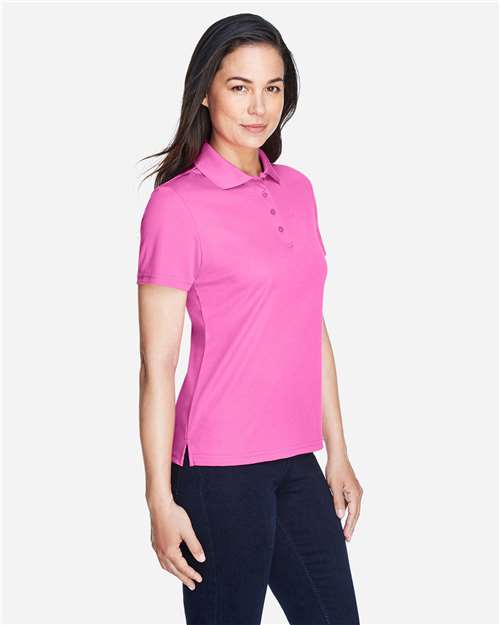 Core 365 78181 Women's Origin Performance Piqué Polo - Charity Pink - model side