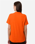 Core 365 CE106W Women's Resolve CVC Performance Pique Polo - Campus Orange - model back