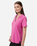 Core 365 CE106W Women's Resolve CVC Performance Pique Polo - Charity Pink - model side