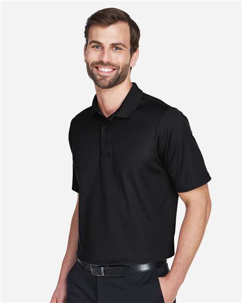 Devon & Jones DG20 Men's CrownLux Performance Plaited Polo - Black - model side