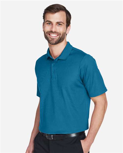 Devon & Jones DG20 Men's CrownLux Performance Plaited Polo - Dark Teal - model side