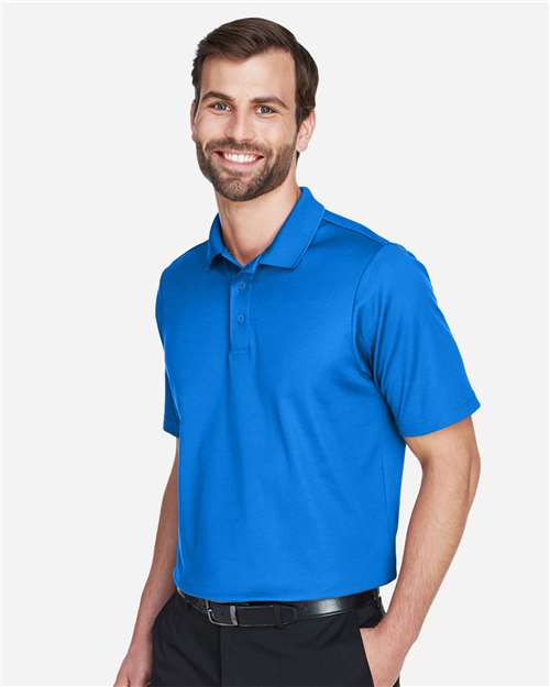 Devon & Jones DG20 Men's CrownLux Performance Plaited Polo - French Blue - model side