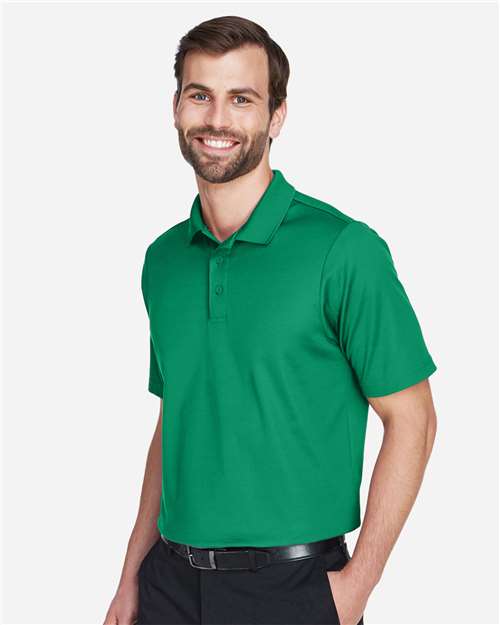 Devon & Jones DG20 Men's CrownLux Performance Plaited Polo - Kelly Green - model side