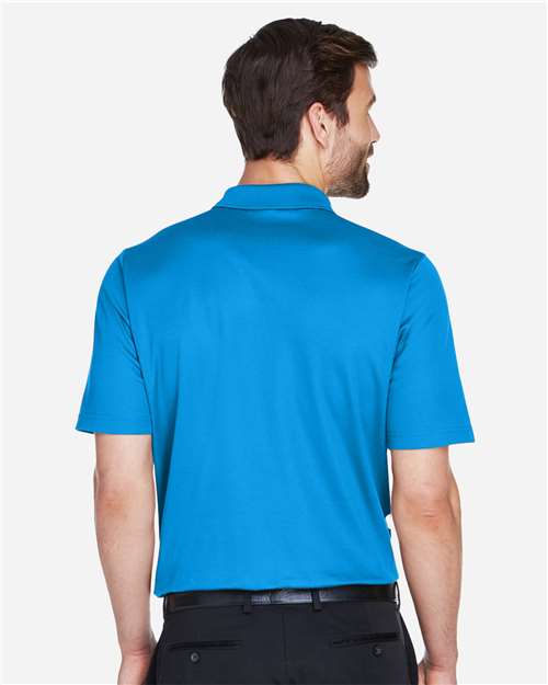 Devon & Jones DG20 Men's CrownLux Performance Plaited Polo - Ocean Blue - model back
