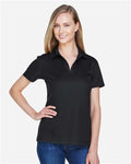 Devon & Jones DG20W Women's CrownLux Performance Plaited Polo - Black - model front