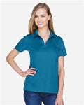 Devon & Jones DG20W Women's CrownLux Performance Plaited Polo - Dark Teal - model front