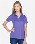 Devon & Jones DG20W Women's CrownLux Performance Plaited Polo - Grape - model front