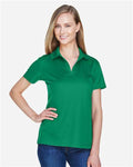 Devon & Jones DG20W Women's CrownLux Performance Plaited Polo - Kelly Green - model front