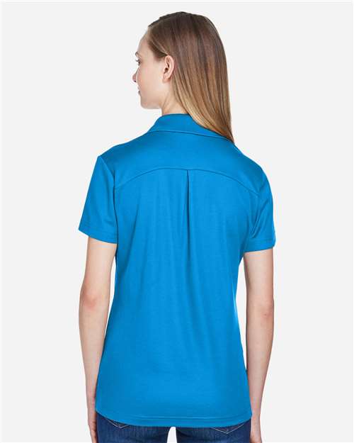 Devon & Jones DG20W Women's CrownLux Performance Plaited Polo - Ocean Blue - model back