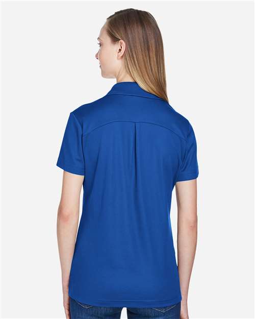 Devon & Jones DG20W Women's CrownLux Performance Plaited Polo - True Royal - model back