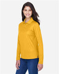 Core 365 78192 Women's Pinnacle Performance Long Sleeve Piqué Polo - Campus Gold - model side